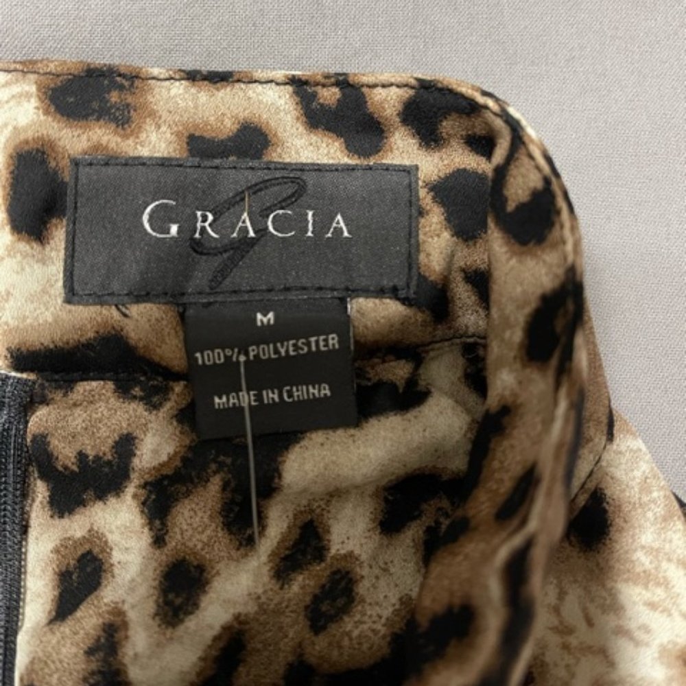 Leopard print long sleeve top with ruffles